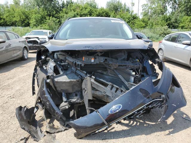 Photo 5 from auction – 2021 FORD ESCAPE SEL with VIN 1FMCU9H93MUA73124