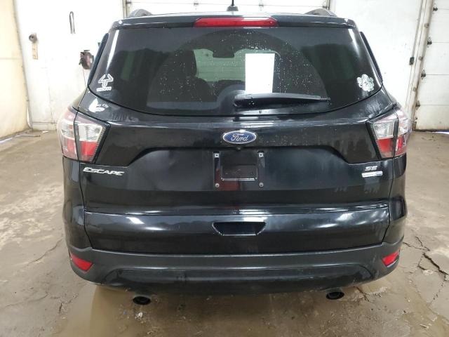 Photo 6 from auction – 2018 FORD ESCAPE SE with VIN 1FMCU9GD5JUD03196