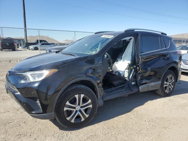 TOYOTA RAV4 LE 2018 with VIN 2T3BFREV6JW832844 - Photo from auction