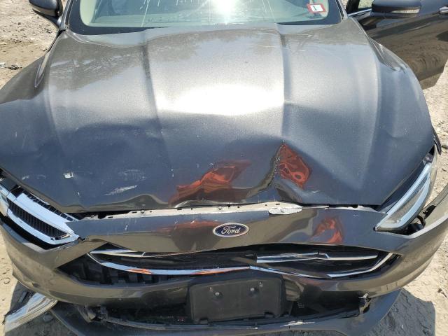 Photo 11 from auction – 2018 FORD FUSION TIT with VIN 3FA6P0D95JR168447