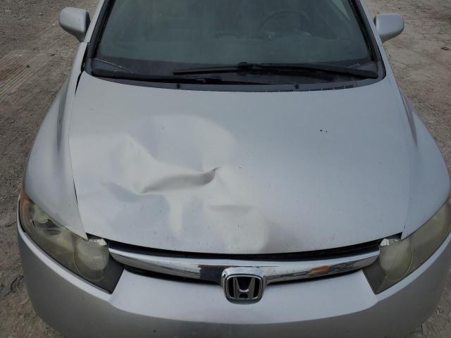 Photo 11 from auction – 2006 HONDA CIVIC EX with VIN JHMFA16886S004688