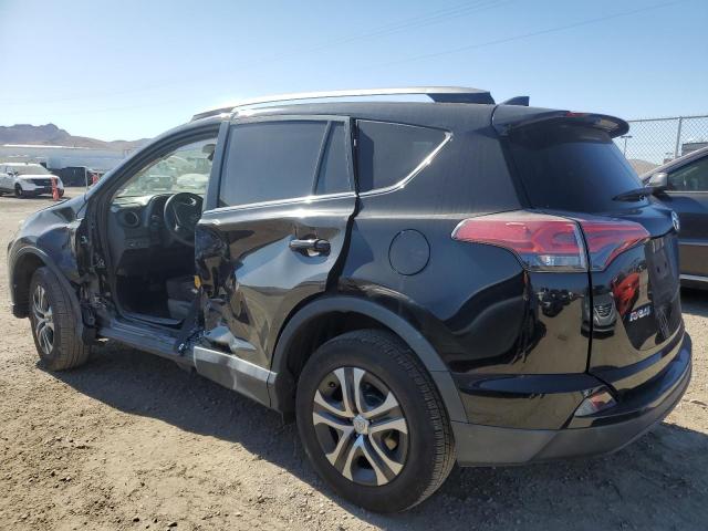 Photo 2 from auction – 2018 TOYOTA RAV4 LE with VIN 2T3BFREV6JW832844