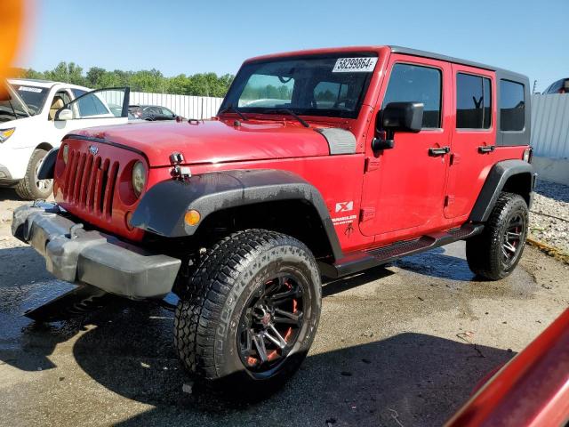 JEEP WRANGLER U 2009 with VIN 1J4GA39149L768868 - Photo from auction