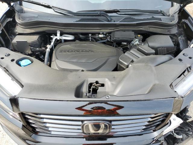 Photo 11 from auction – 2023 HONDA RIDGELINE with VIN 5FPYK3F13PB048920