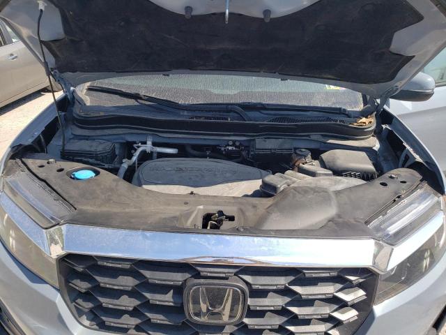 Photo 12 from auction – 2022 HONDA PASSPORT E with VIN 5FNYF8H56NB000948
