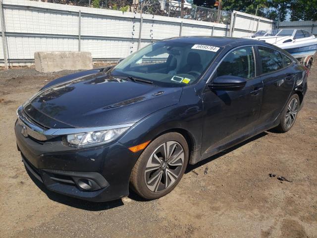 HONDA CIVIC EX 2017 with VIN 19XFC1F34HE206871 - Photo from auction