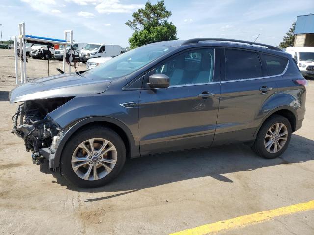 FORD ESCAPE SE 2018 with VIN 1FMCU0GD7JUD18620 - Photo from auction