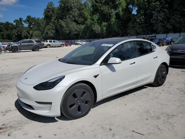 TESLA MODEL 3 2022 with VIN 5YJ3E1EB8NF328497 - Photo from auction