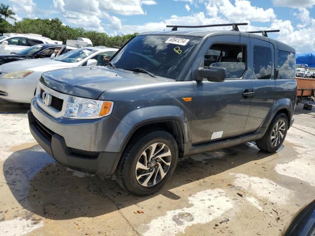 HONDA ELEMENT LX 2011 with VIN 5J6YH1H35BL001284 - Photo from auction