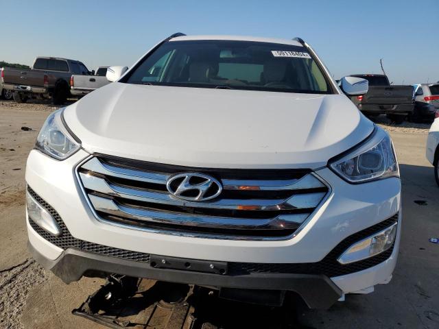 Photo 5 from auction – 2014 HYUNDAI SANTA FE S with VIN 5XYZU3LA2EG220176