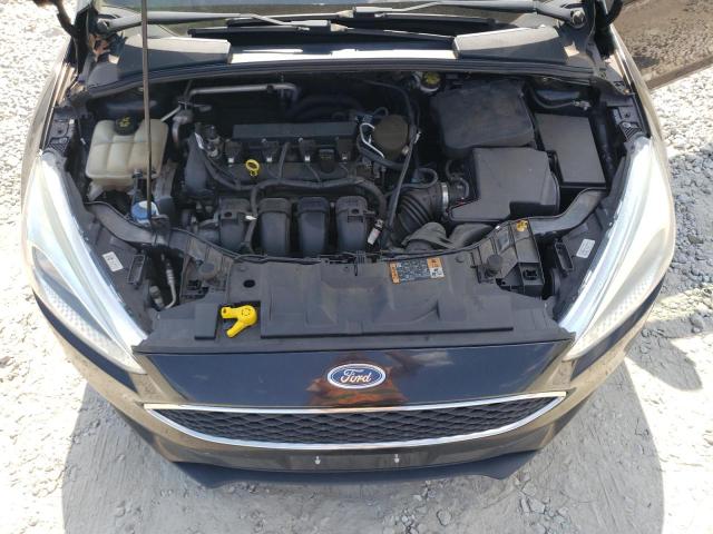 Photo 11 from auction – 2015 FORD FOCUS SE with VIN 1FADP3F24FL242570