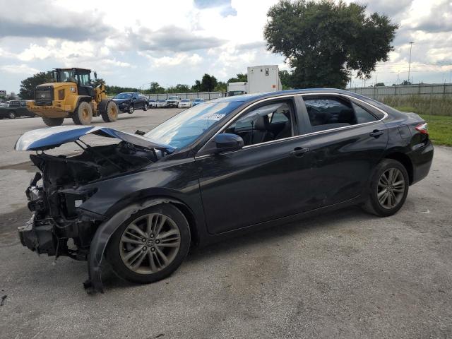 TOYOTA CAMRY LE 2017 with VIN 4T1BF1FKXHU302742 - Photo from auction