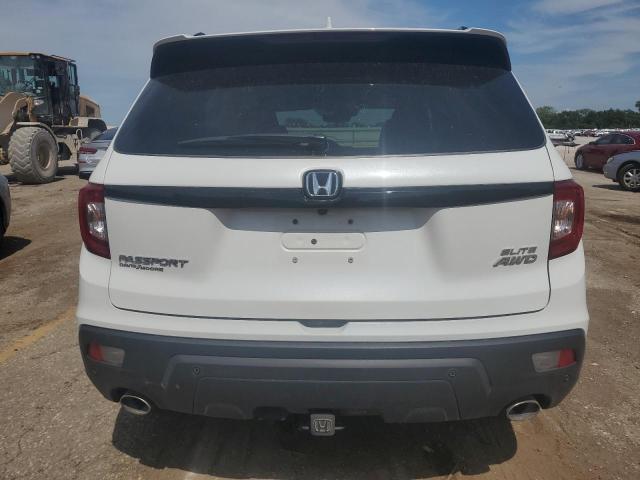 Photo 6 from auction – 2021 HONDA PASSPORT E with VIN 5FNYF8H08MB003823