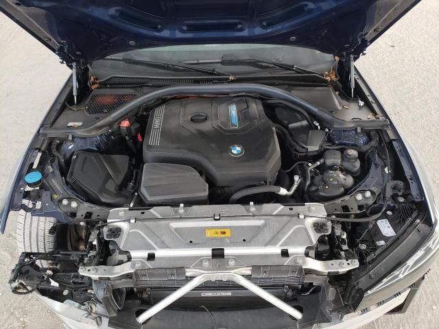 Photo 11 from auction – 2023 BMW 330E with VIN 3MW39FF06P8C84356