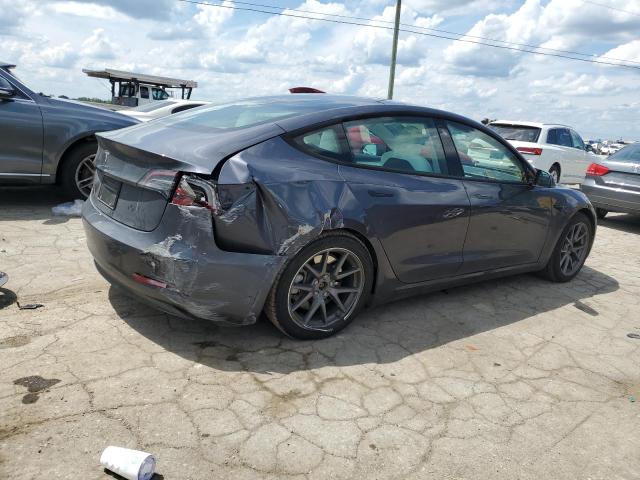 Снимка 3 от търг – 2023 TESLA MODEL 3 с VIN 5YJ3E1EA1PF712910