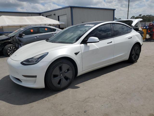 TESLA MODEL 3 2021 with VIN 5YJ3E1EA7MF861057 - Photo from auction