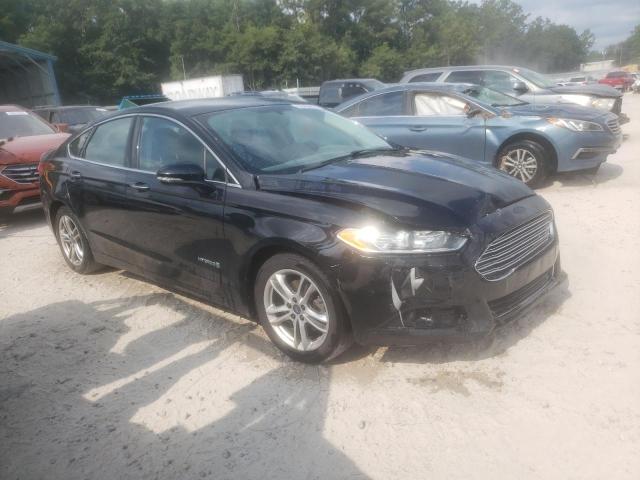 Photo 4 from auction – 2016 FORD FUSION TIT with VIN 3FA6P0RU9GR323913