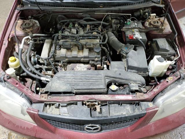 Photo 11 from auction – 2002 MAZDA PROTEGE with VIN JM1BJ225021620581