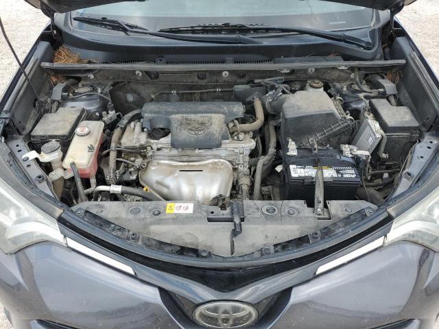 Photo 11 from auction – 2018 TOYOTA RAV4 LE with VIN JTMZFREV2JJ158608