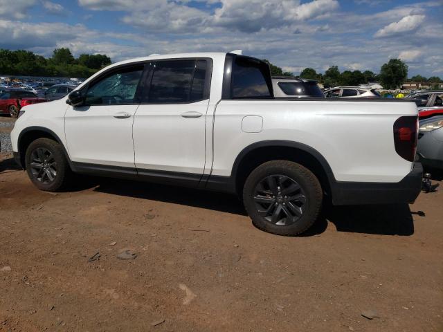 Photo 2 from auction – 2023 HONDA RIDGELINE with VIN 5FPYK3F15PB056663