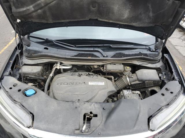 Photo 12 from auction – 2016 HONDA PILOT ELIT with VIN 5FNYF6H05GB012228
