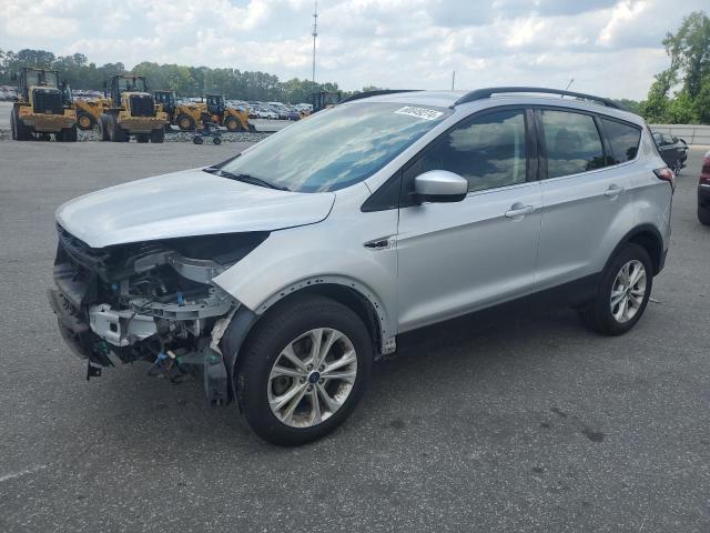 FORD ESCAPE SE 2018 with VIN 1FMCU9GD7JUB42009 - Photo from auction