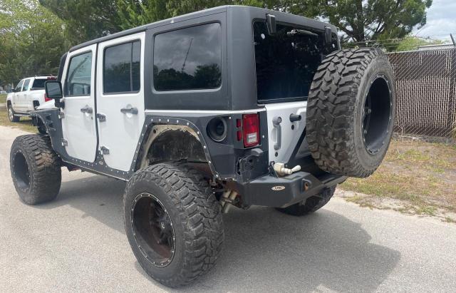 Photo 3 from auction – 2013 JEEP WRANGLER U with VIN 1C4BJWDG9DL701513