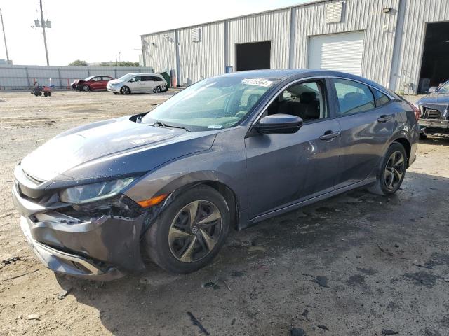 HONDA CIVIC LX 2019 with VIN 19XFC2F69KE016944 - Photo from auction