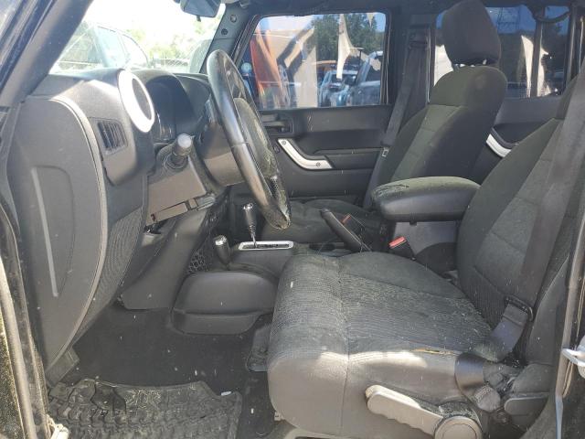 Photo 7 from auction – 2011 JEEP WRANGLER U with VIN 1J4BA5H14BL632737