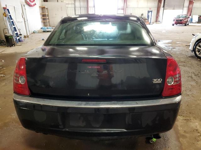 Photo 6 from auction – 2009 CHRYSLER 300 LIMITE with VIN 2C3KA33V89H635611