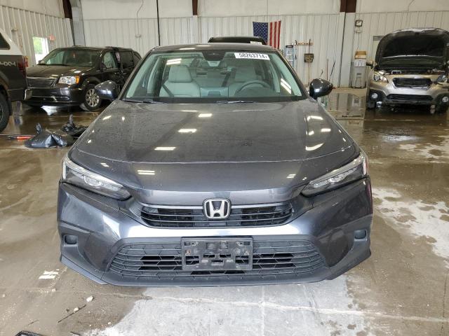 Photo 5 from auction – 2022 HONDA CIVIC LX with VIN 2HGFE2F22NH524979