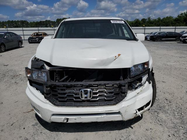 Photo 5 from auction – 2014 HONDA RIDGELINE with VIN 5FPYK1F69EB010394