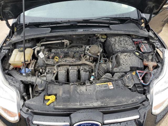 Photo 11 from auction – 2014 FORD FOCUS SE with VIN 1FADP3F20EL113398