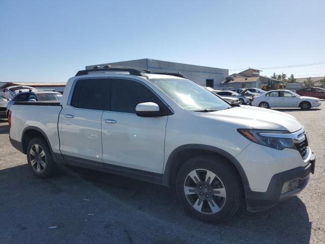 Фото 4 с аукциона – 2018 HONDA RIDGELINE с VIN 5FPYK3F70JB002893