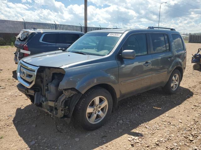 HONDA PILOT EXL 2011 with VIN 5FNYF4H56BB033999 - Photo from auction