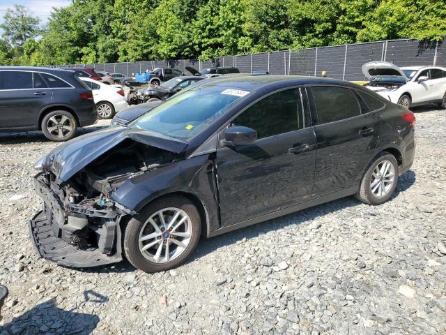 FORD FOCUS SE 2018 with VIN 1FADP3F22JL214999 - Photo from auction
