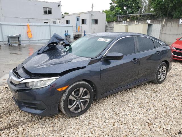 HONDA CIVIC LX 2018 with VIN 19XFC2F52JE044395 - Photo from auction