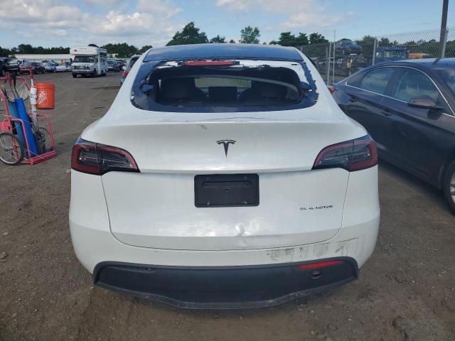 Photo 6 from auction – 2023 TESLA MODEL Y with VIN 7SAYGDEE6PF604497