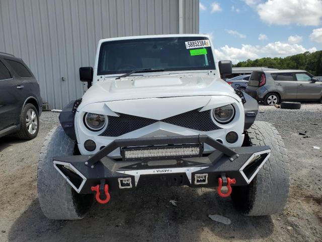 Photo 5 from auction – 2016 JEEP WRANGLER U with VIN 1C4BJWKG3GL266382
