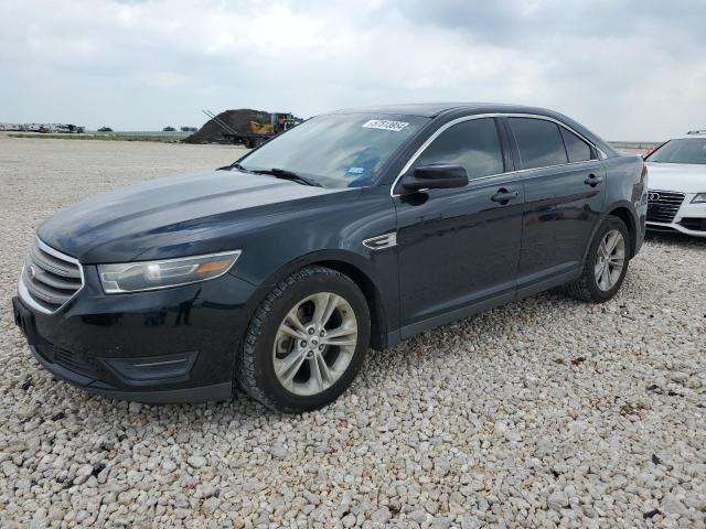 FORD TAURUS SEL 2014 with VIN 1FAHP2E8XEG174302 - Photo from auction