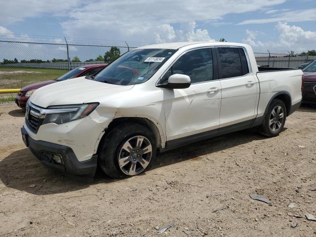 HONDA RIDGELINE 2017 with VIN 5FPYK2F64HB005713 - Photo from auction