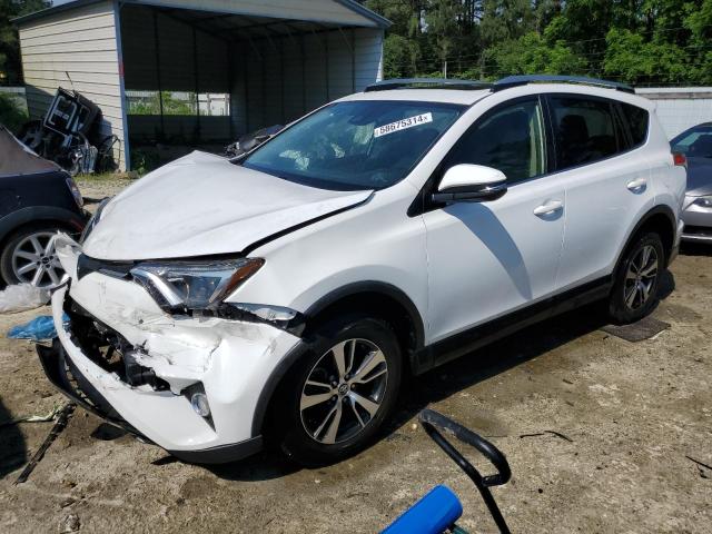 TOYOTA RAV4 XLE 2017 with VIN JTMRFREV8HD216858 - Photo from auction