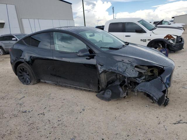 Photo 4 from auction – 2023 TESLA MODEL Y with VIN 7SAYGAEE6PF594374