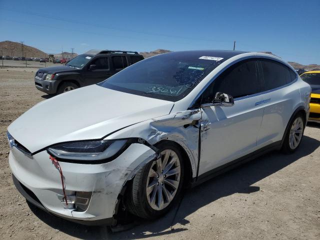 TESLA MODEL X 2018 with VIN 5YJXCBE23JF142826 - Photo from auction