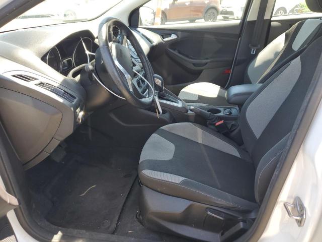 Photo 7 from auction – 2014 FORD FOCUS SE with VIN 1FADP3F20EL311799
