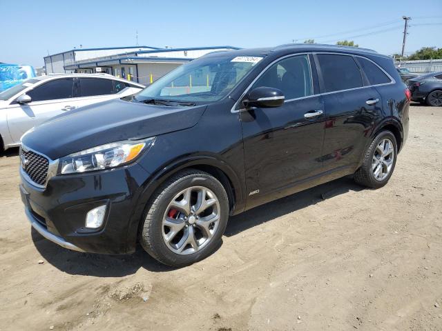 KIA SORENTO SX 2016 with VIN 5XYPKDA59GG151174 - Photo from auction