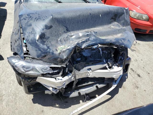 Photo 11 from auction – 2024 BMW 330XE with VIN 3MW39FS05R8D90208