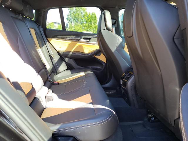Photo 10 from auction – 2022 BMW X4 M with VIN 5YM23EC06N9K29768