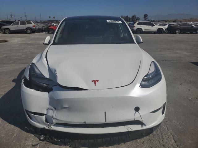 Photo 5 from auction – 2023 TESLA MODEL Y with VIN 7SAYGDEE8PA035410