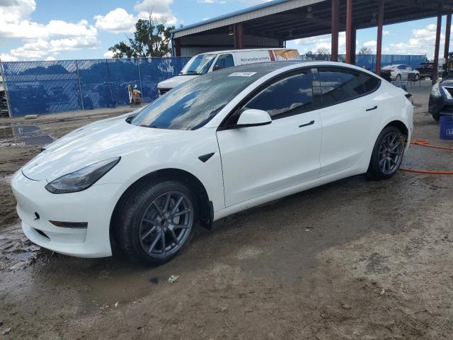 TESLA MODEL 3 2023 with VIN 5YJ3E1EA7PF385512 - Photo from auction